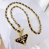 Europe and the United States wind tide brand necklace inverted triangle geometric letters pendant Metal Chain Black Leather Strap